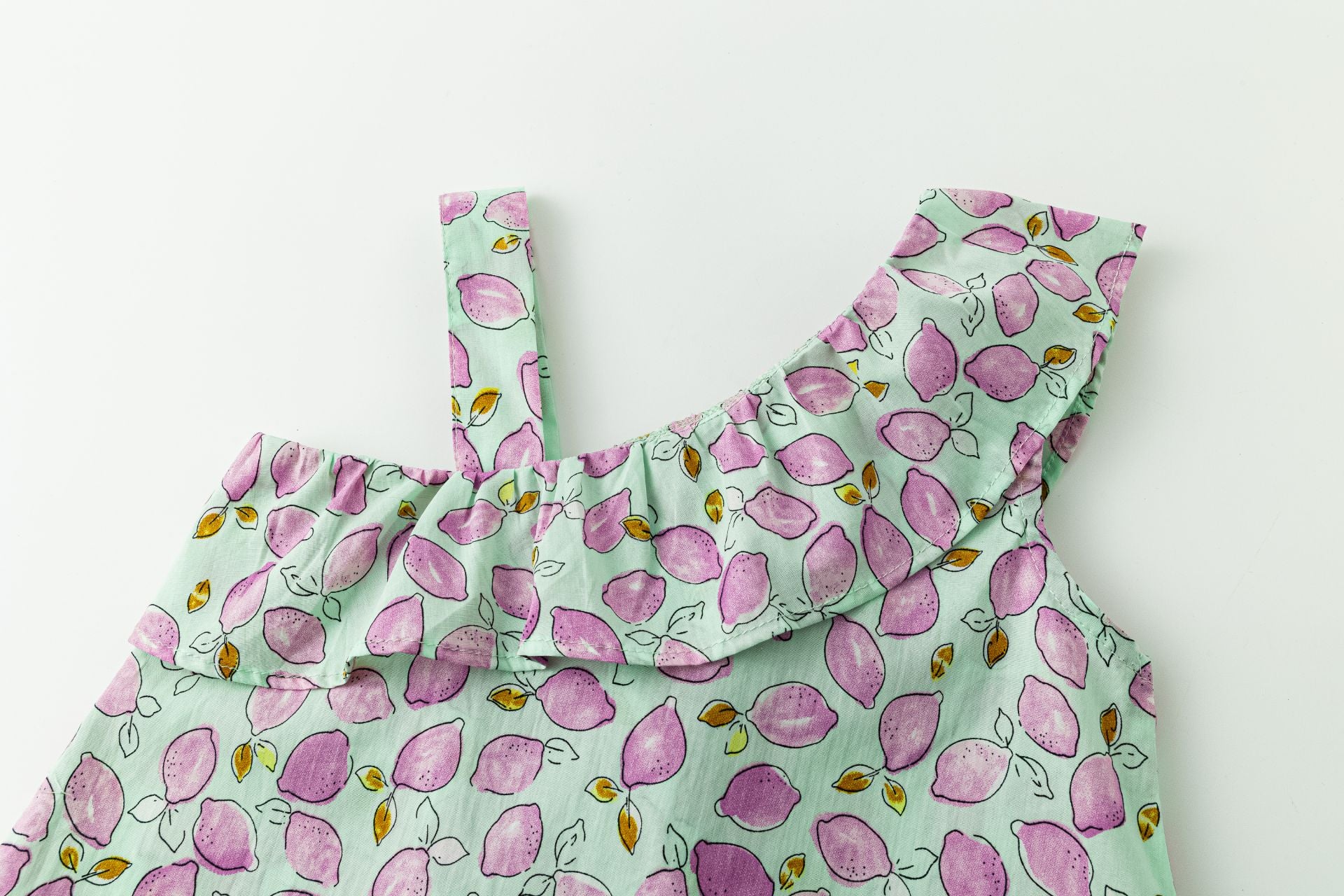 Top Asimétrico Limones Morados