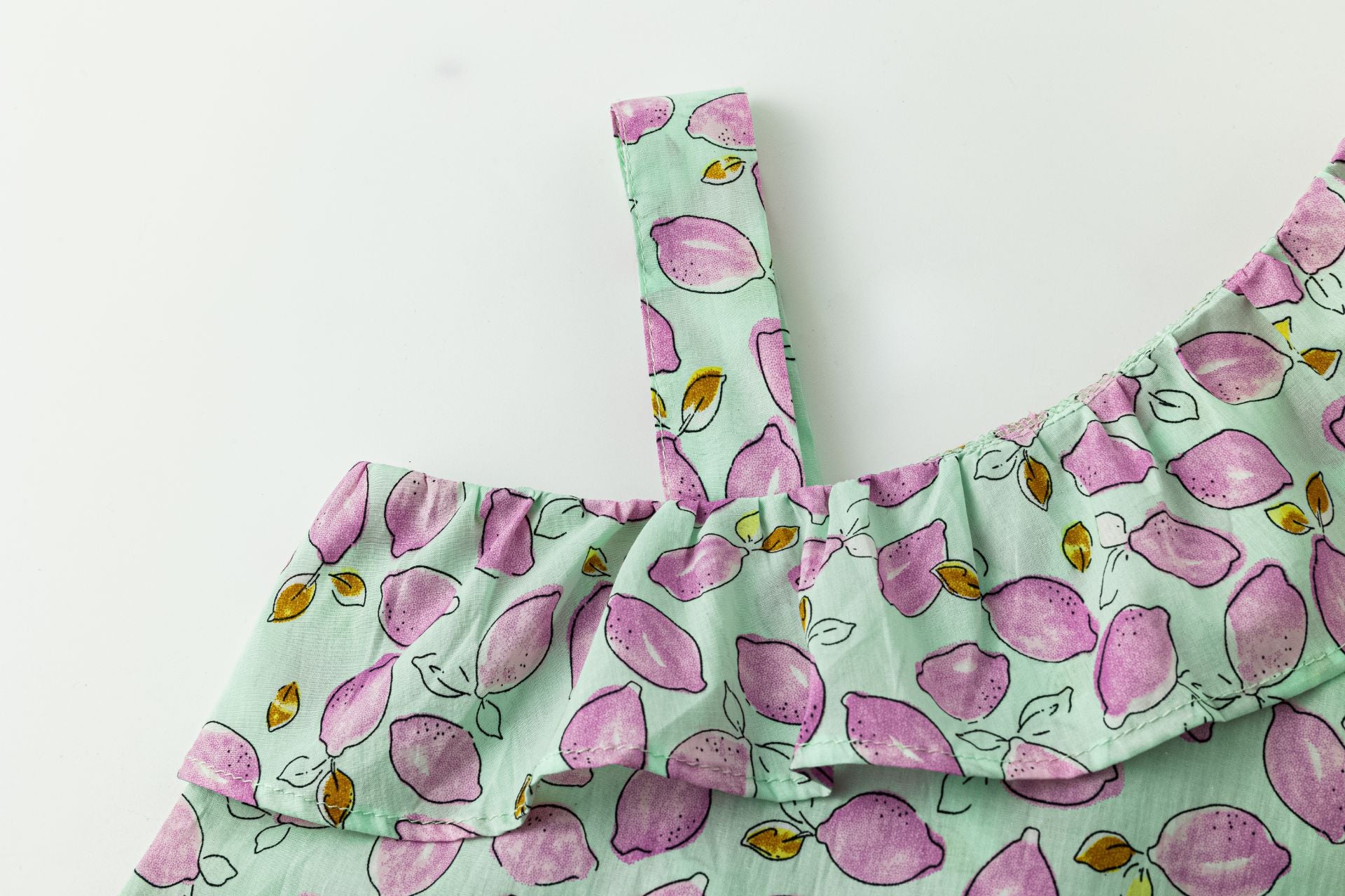 Top Asimétrico Limones Morados