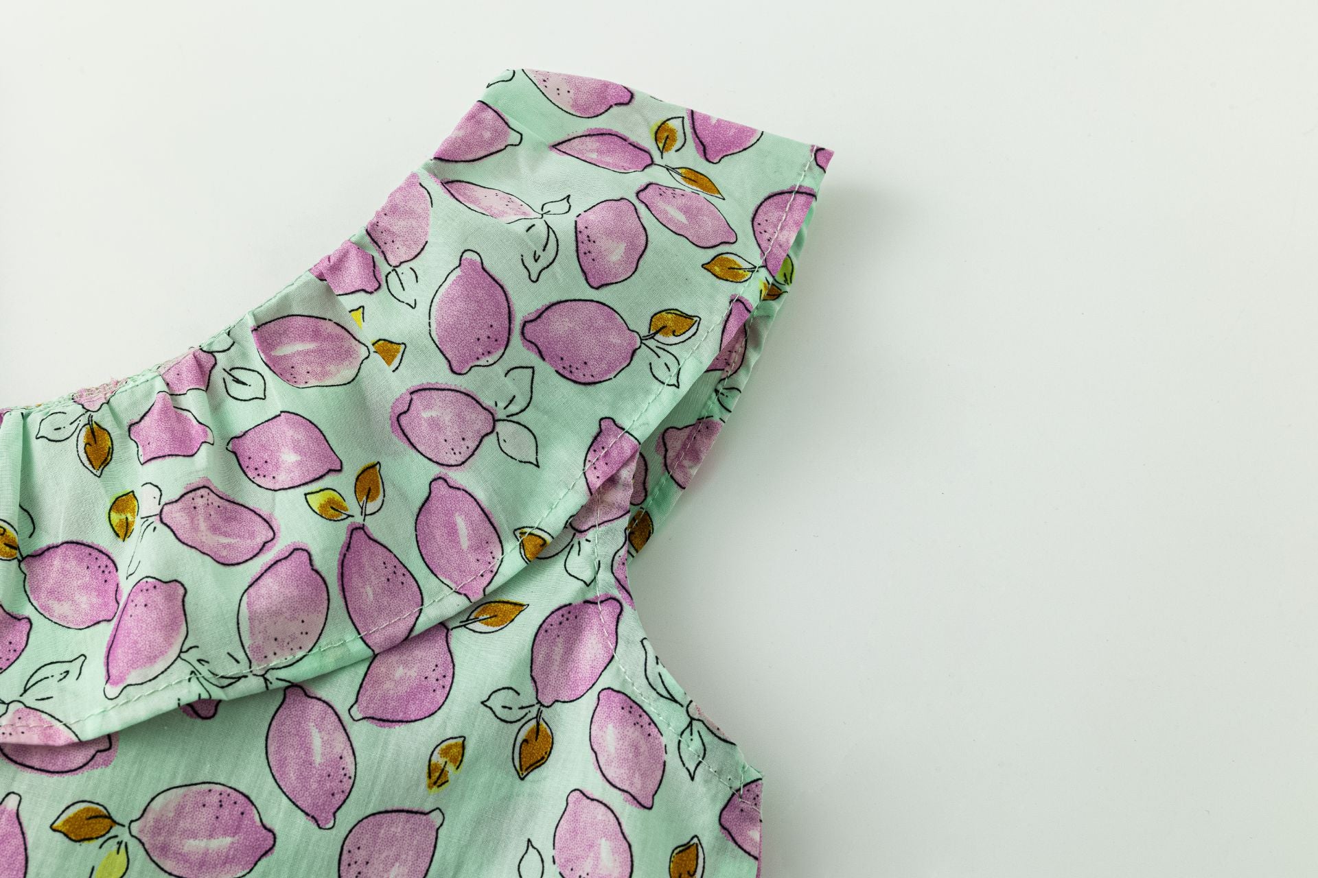 Top Asimétrico Limones Morados