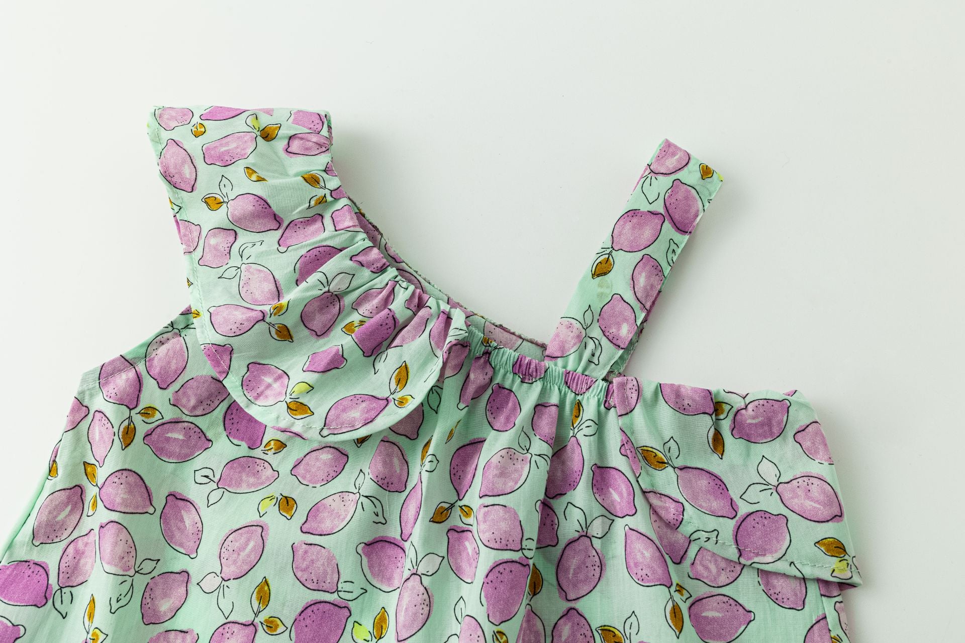 Top Asimétrico Limones Morados