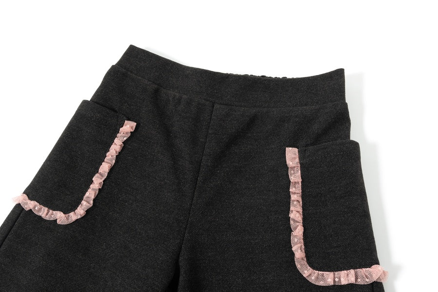 Pantalón felpa volante tul