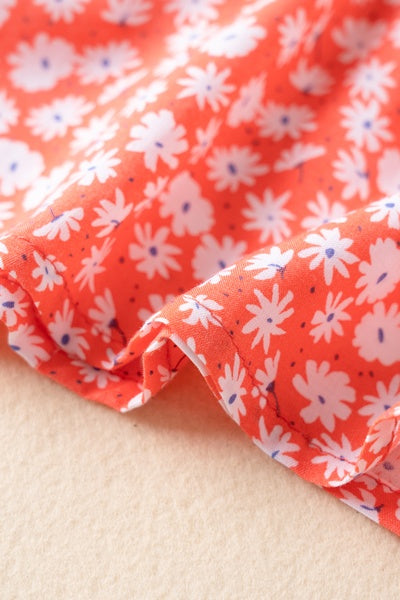 Tirante flores naranja