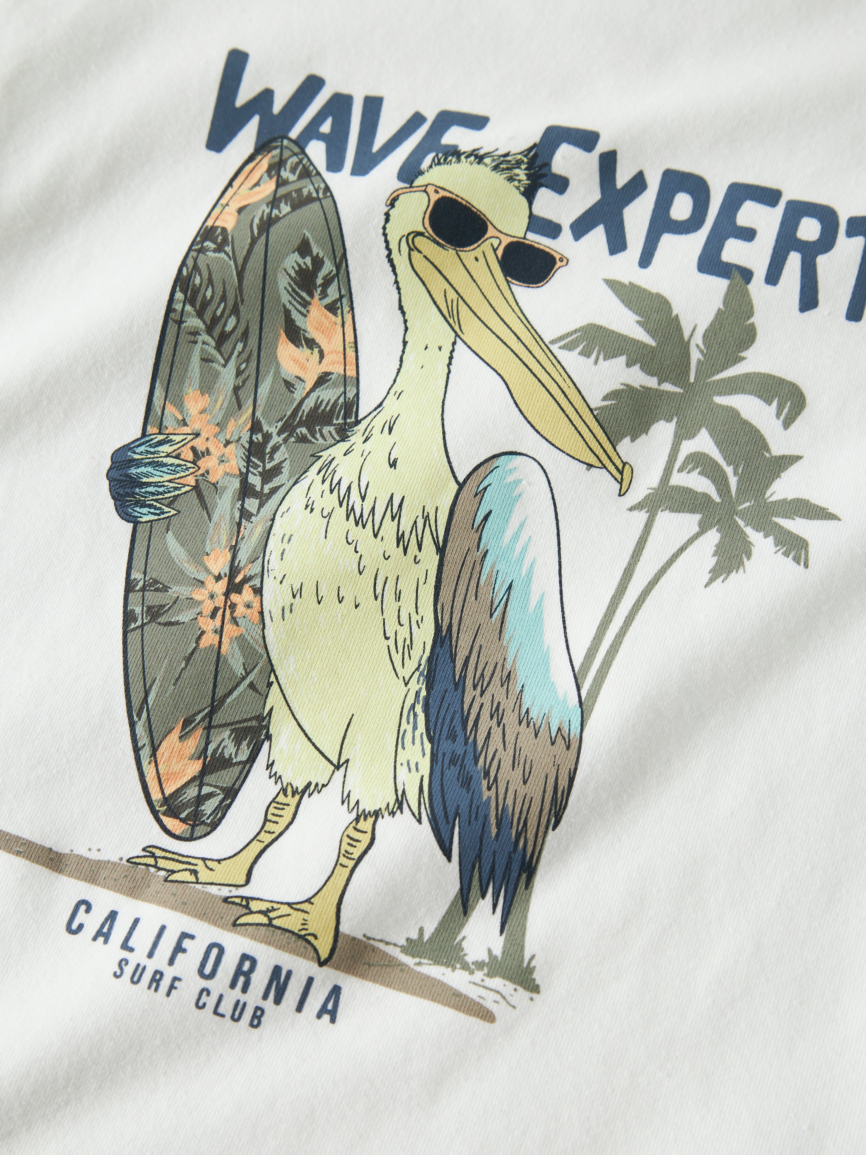 Camiseta Pelícano Surf Blanca Mini